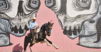 Black cowboy on his horse