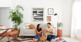Ruggable washable rug people in living room with dog